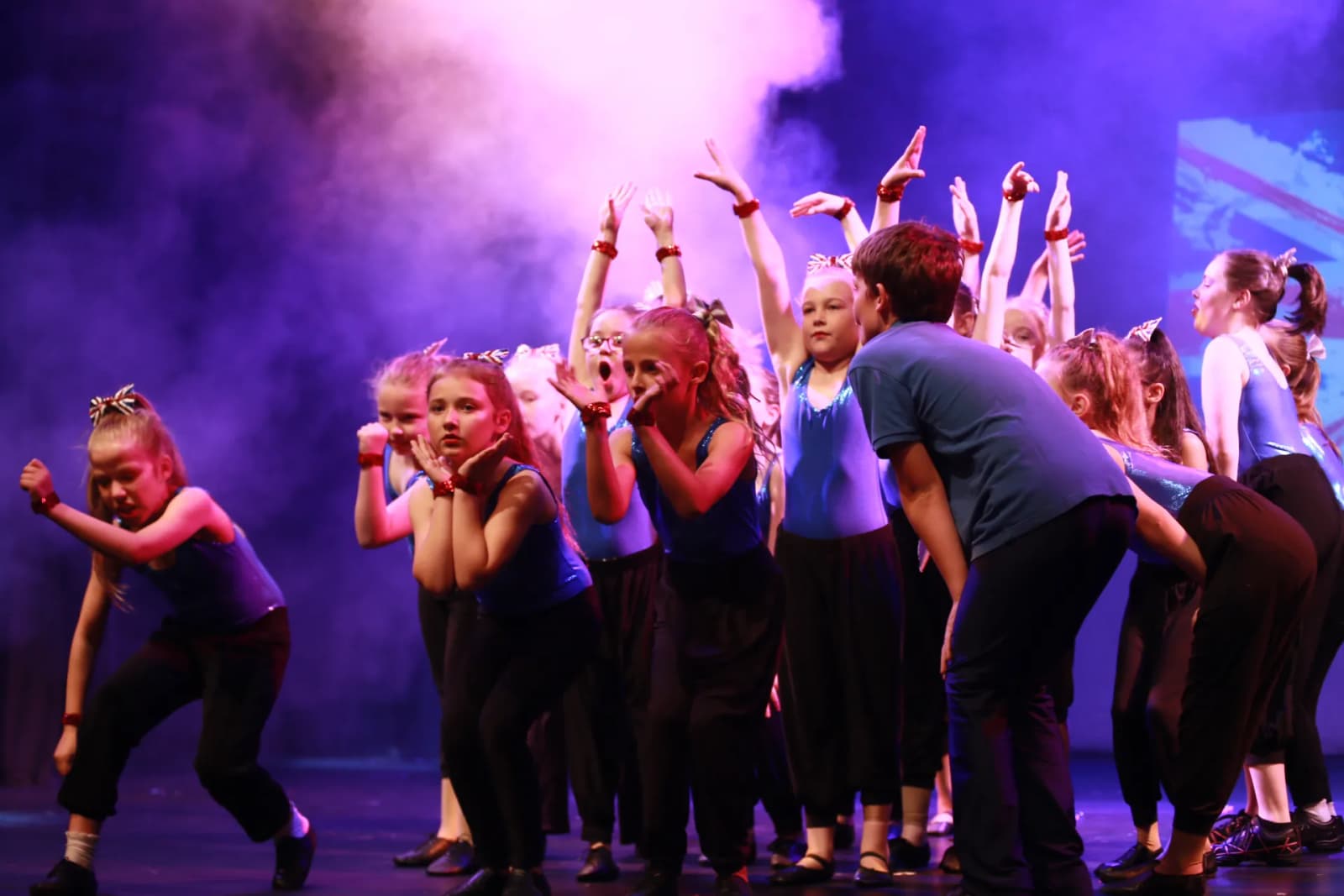 Star-Struck cast in a high-energy ensemble number on stage
